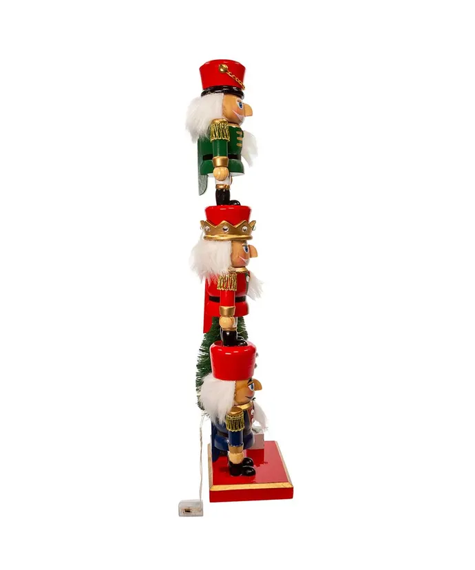 18"NUTCRACKER W/LIGHT UP TREE.